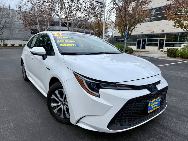 Super White, 2021 Toyota Corolla Hybrid Image 